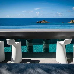  vacation rental photo St Barthelemy WV AXL Villa Axel Rocks St Barts Villa axldin01 desktop SBP