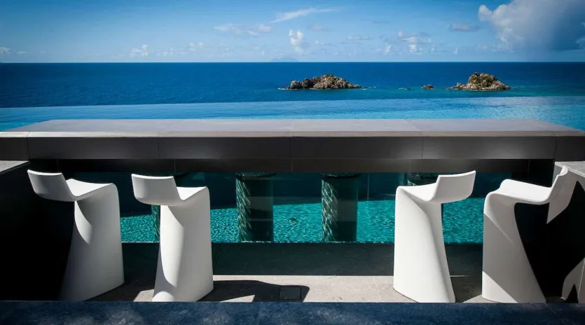  vacation rental photo St Barthelemy WV AXL Villa Axel Rocks St Barts Villa axldin01 desktop SBP